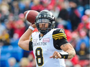Jeremiah Masoli of the Hamilton Tiger-Cats makes a pass against the Calgary Stampeders during a CFL game at McMahon Stadium on June 16, 2018 in Calgary.