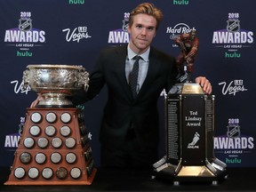 Connor McDavid of the Edmonton Oilers poses with the Ted Lindsay Award given to the most outstanding player as voted by the NHLPA at the 2018 NHL Awards in Las Vegas on Wednesday night. McDavid also won the Art Ross Trophy as the league's leading scorer.