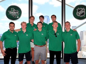 Top prospects Evan Bouchard, Rasmus Dahlin, Adam Boqvist, Noah Dobson, Quintin Hughes, Filip Zadina, Brady Tkachuk and Andrei Svechnikov pose for a group photo while visiting Reunion Tower in Dallas ahead of the 2018 NHL Draft on June 21.