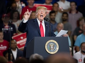 U.S. President Donald Trump speaks to the crowd during a campaign rally for South Carolina Governor Henry McMaster at Airport High School June 25, 2018 in West Columbia, South Carolina.