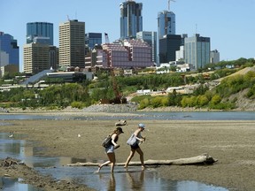 Edmonton's "accidental beach" on the south bank of the North Sakstahcewan River near downtown Edmonton on June 20, 2018. The City of Edmonton has added infastructure that includes signs, bike racks, porta-potties and garbage cans. Restricted parking and traffic flow will also be in effect.
