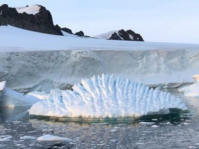 Handout photo taken on January 8, 2018 and received on June 12, 2018 via the Nature website shows unusual iceberg at Rothera Research Station, Antarctic Peninsula.