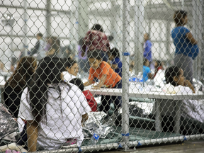 Illegal border crossers at the Central Processing Center on June 17, 2018 in McAllen, Texas.
