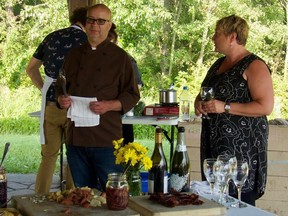 Chef Brad Smoliak (left), is hosting farm-to-fork, long-table supper in Leduc county's Old Red Barn this summer. This photo was taken last summer at one of Smoliak's signature Prairie suppers at Elk Island park.