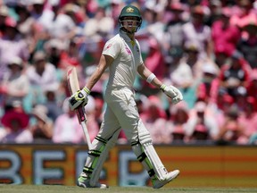 Australia's Steve Smith walks off after he was caught and bowled by England's Moeen Ali during the third day of their Ashes cricket Test match in Sydney on January 6, 2018. The Global T20 Canada cricket tournament kicks off Thursday north of Toronto with West Indies stars Darren Sammy and Chris Gayle leading teams from Toronto and Vancouver, respectively. But many eyes will be on Steve Smith, the former Australian captain making his return to cricket after a high-profile ball-tampering scandal.