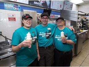 Mike Liber,(middle) who owns a DQ on baseline road in Sherwood Park, with two of his mentally challenged employees, Brittany St Savard (left) and Ryan Steedman (right) on Thursday, June 14, 2018.