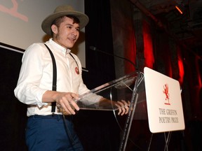 Edmonton poet Billy-Ray Belcourt accepting the Griffin Prize, Canada's biggest poetry honour on Thursday, June 7, 2018 at the Toronto Gala.