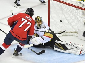 Washington Capitals right wing T.J. Oshie scores with Vegas Golden Knights goaltender Marc-Andre Fleury out of position in the first period of Game 4 of the Stanley Cup final on Monday.