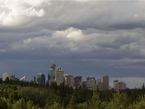 A thunderstorm rolls over downtown, as seen from the southside of the river in Edmonton, on Monday, June 4, 2018.