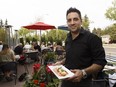 Rebel Food and Drink manager Lino Rago holds Mamma's Got Balls, a popular patio dish.