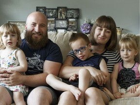 (Left to right) Rose Fry, Adam Fry, William Fry, Shannon Epler and Mackenzie Fry pose for a photo at home in Edmonton, on Friday, June 8, 2018. William, 5, is in a kindergarten class at Tipaskan School with 33 children, which is above the 17 children recommended by the Alberta Commission on Learning.