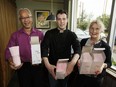 Hong Vu, left, Adam Stoyko and Kim Franklin hold boxes of straws they will return as the Highlevel Diner cuts down on plastic waste by phasing out plastic straws in Edmonton, on Sunday, June 10, 2018.