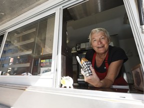 Thea Avis with Meat Street Pies shows the food truck's pie at the City Market Downtown in Edmonton, on Saturday, June 16, 2018. The food truck serves a wide variety of savoury pies.