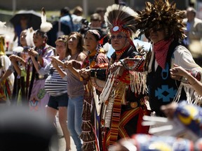 A round dance is held during an advance celebration of National Indigenous Peoples Day at Edmonton International Airport, on Wednesday, June 20, 2018.