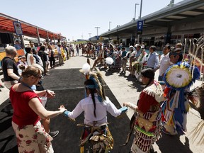 A round dance is held during an advance celebration of National Indigenous Peoples Day at Edmonton International Airport, on Wednesday, June 20, 2018.