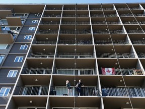 Cayman Alexander and Emily Thomas woke up to a man scaling their apartment balcony at 10711 Capital Blvd. in Edmonton on June 17, 2018. The man was arrested by police after making it to the sixth floor.