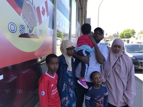 Yussuf Madey Mahamed, his wife Halima Ibrahim Ali and their four kids outside the Ogaden Somali Community of Alberta Residents office on 111 Avenue in Edmonton June 2, 2018. Mahamed was ordered deported from Canada June 4 and was appealing to officials for more time for his application to stay in the country to be completed.
