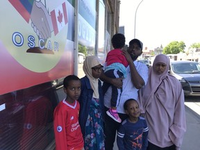 Yussuf Madey Mahamed, his wife Halima Ibrahim Ali and their four kids outside the Ogaden Somali Community of Alberta Residents office on 111 Avenue in Edmonton June 2, 2018. Mahamed was ordered deported from Canada June 4 and was appealing to officials for more time for his application to stay in the country to be completed.