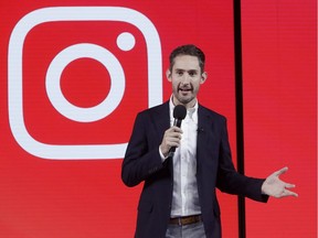 In this Tuesday, June 19, 2018, photo Kevin Systrom, CEO and co-founder of Instagram, prepares for Wednesday's announcement about IGTV in San Francisco. Facebook's Instagram app is loosening its restraints on video with a new channel that will attempt to lure younger viewers away from Google's YouTube and pave the way to sell more advertising.