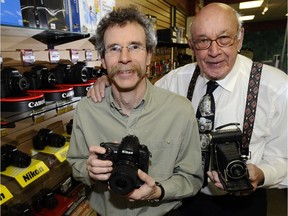 McBain Camera general manager Neil McBain, left, with his father Ross McBain in this 2009 photo marking the company's 60th anniversary.