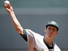 Oakland Athletics starting pitcher Daniel Gossett throws during the first inning of a baseball game against the Kansas City Royals, Sunday, June 3, 2018, in Kansas City, Mo.