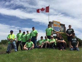 No One Walks Alone participants take a photo outside the hamlet of Bruce during the 2017 edition of the 24-hour walk for the Alberta HELP Fund.