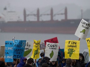 A group of protesters gathers outside the Northern Gateway hearings in Prince Rupert, B.C. Monday, December, 10, 2012. File photo.