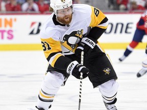 FILE - In this April 26, 2018, file photo, Pittsburgh Penguins right wing Phil Kessel (81) skates with the puck during the first period in Game 1 of an NHL second-round hockey playoff series against the Washington Capitals, in Washington. With GMs meeting Thursday, June 21, in Dallas and around each other this weekend at the draft, trade talk is percolating before free agency opens July. Kessel, Ottawa winger Mike Hoffman, Buffalo center Ryan O'Reilly, Montreal captain Max Pacioretty and Washington backup goaltender Philipp Grubauer could all be on the move in the next several days.