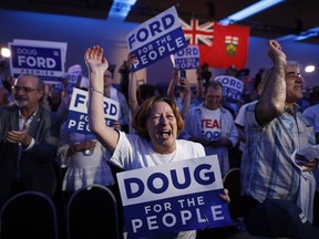 Ontario PC leader Doug Ford supporters react to his victory in the Ontario provincial election at his election night headquarters in Toronto on Thursday, June 7, 2018.