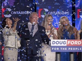 Ontario PC leader Doug Ford reacts with his family after winning the Ontario provincial election to become the new premier, in Toronto on Thursday, June 7, 2018.