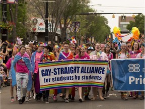 Participants take part in the Edmonton Pride parade on Saturday, June 9, 2018.