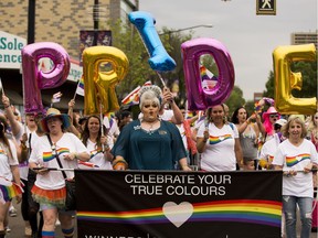 Participants take part in the Edmonton Pride parade on Saturday, June 9, 2018.