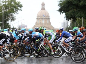 Tour of Alberta racers make their way past the Alberta legislature during the final stage of the Tour of Alberta on Sept. 7, 2014. The Tour dreamed of putting the province in the international cycling spotlight. The race succeeded in drawing fans, but ultimately failed in financing.