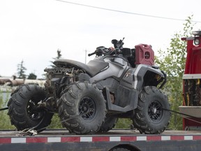 A damaged quad is removed from the Rig Shop parking lot. A 26 year-old man was killed when the ATV he was riding rolled in the parking lot of an industrial shop in east Edmonton on June 30, 2018