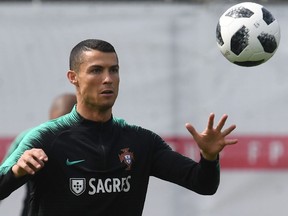 Portugal's forward Cristiano Ronaldo attends a training session at the team's base camp in Kratovo, on the outskirts of Moscow, on June 12, 2018, ahead of the Russia 2018 World Cup football tournament. Francisco Leong / Getty Images