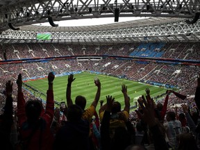 Fans cheer during a 2018 soccer World Cup group A gme on June 14, 2018, at the Luzhniki stadium in Moscow, Russia. Some South American fans at the World Cup in Russia are receiving strong criticism for sexist behavior and could even face workplace consequences for posting videos in which fans encourage foreign women to say offensive things in languages they don't appear to understand.