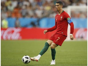 Portugal's Cristiano Ronaldo passes the ball during the group B match between Iran and Portugal at the 2018 soccer World Cup at the Mordovia Arena in Saransk, Russia, Monday, June 25, 2018.