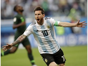 Argentina's Lionel Messi celebrates after scoring the opening goal of his team during the group D match between Argentina and Nigeria, at the 2018 soccer World Cup in the St. Petersburg Stadium in St. Petersburg, Russia, Tuesday, June 26, 2018.