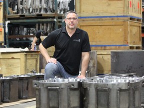 Attica Manufacturing president Andy Mavrokefalos on Monday June 11, 2018, showcases steel traction motor housings that are made at the company's south London plant. DALE CARRUTHERS / THE LONDON FREE PRESS