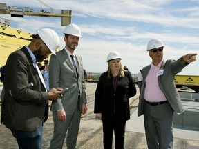 Edmonton-Centre MLA David Sheppard, left, Edmonton Mayor Don Iveson, Coun. Bev Esslinger and The Christenson Group of Companies owner Greg Christenson at a 'topping off' ceremony for the Village at Westmount on Monday June 25, 2018. The Village at Westmount is a showpiece senior's community that will be an integral part of a walkable urban village and neighbourhood hub. It will be a new addition to the ongoing transformation of the Westmount mall area and the revitalization of the popular mature neighbourhoods of Westmount, Woodcroft, Dovercourt and Sherbrooke.