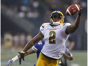 Edmonton Eskimos' C.J. Gable attempts to make a catch under coverage from Winnipeg Blue Bombers' Jovan Santos-Knox (45) during CFL action in Winnipeg on Thursday, June 14, 2018.