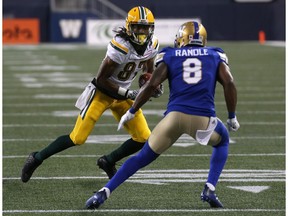 Edmonton Eskimos WR Derel Walker (left) sizes up Winnipeg Blue Bombers DB Chris Randle during CFL action in Winnipeg on Thurs., June 14, 2018. Kevin King/Winnipeg Sun/Postmedia Network