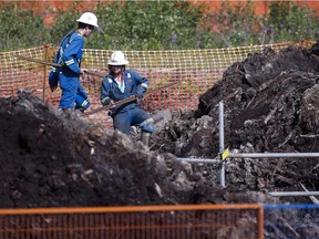 A Nexen-supplied image of a pipeline oil spill near the Long Lake oilsands operation is shown at a press conference in Calgary in July 2015.