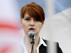 In this photo taken on Sunday, April 21, 2013, Maria Butina, leader of a pro-gun organization in Russia, speaks to a crowd during a rally in support of legalizing the possession of handguns in Moscow, Russia.