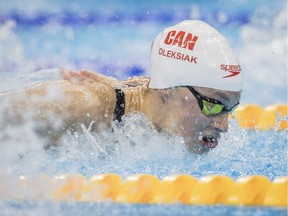 Penny Oleksiak competes in the Women's 100m Butterfly semi-final during the first official day of competition at the Rio 2016 Olympic Games in Rio de Janeiro on Aug. 6, 2016.