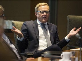 Education Minister David Eggen meets with academics, non-profit organization leaders, industry representatives and others to discuss the proposed new K-12 math curriculum at the Federal Building in Edmonton Thursday July 19, 2018. Photo by David Bloom