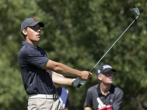 A.J. Armstrong watches his tee shot on the 10th hole during the Sun Life Financial Mens Amateur Championship on July 19, 2018, at RedTail Landing Golf Club in Nosku, Alta.