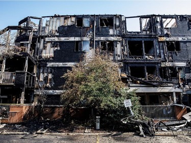 Extensive damage is seen at the scene of a fire in the Blue Quill neighbourhood in Edmonton on Sunday, July 29, 2018.