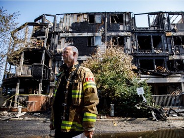 District Fire Chief Ed Pitman speaks at the scene of a fire in the Blue Quill neighbourhood in Edmonton on Sunday, July 29, 2018.