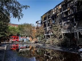 Extensive damage is seen at the scene of a fire in the Blue Quill neighbourhood in Edmonton on Sunday, July 29, 2018.